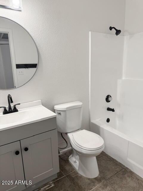 5975 N 48th Dr, Glendale, AZ 85301 - bathroom with vanity, toilet, shower / tub combination, and tile patterned flooring