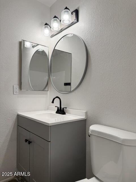 5975 N 48th Dr, Glendale, AZ 85301 - bathroom featuring toilet and vanity
