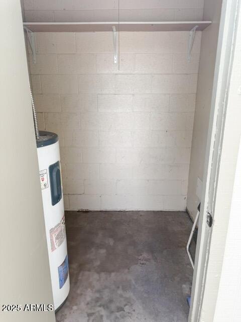 5975 N 48th Dr, Glendale, AZ 85301 - below grade area with water heater and concrete block wall