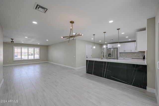 ranch-style home featuring a garage