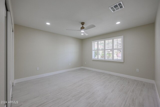 kitchen with sink, kitchen peninsula, pendant lighting, white cabinetry, and appliances with stainless steel finishes