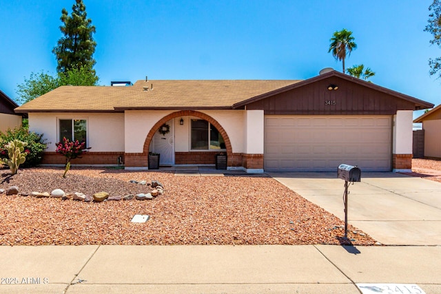 3415 E Anderson Dr, Phoenix, AZ 85032 - ranch-style house featuring driveway, brick siding, a garage, and a shingled roof