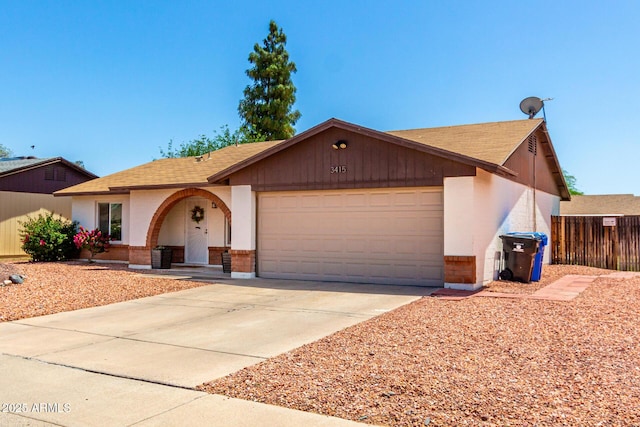 3415 E Anderson Dr, Phoenix, AZ 85032 - single story home featuring a garage, brick siding, concrete driveway, and a shingled roof