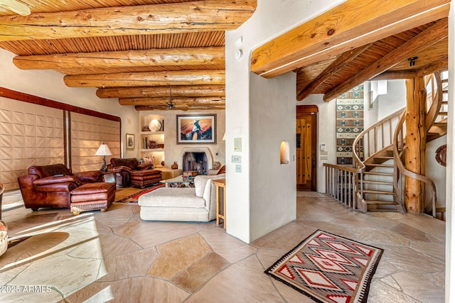 living room with wood ceiling and beam ceiling