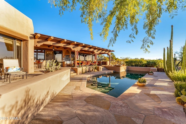 view of swimming pool featuring a patio and a pergola