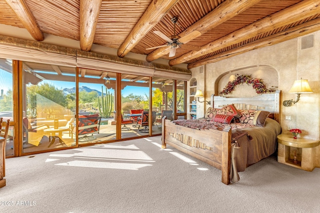 carpeted bedroom with access to exterior, a mountain view, beam ceiling, and wooden ceiling