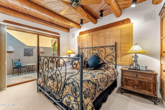 carpeted bedroom featuring wood ceiling, access to outside, and beamed ceiling