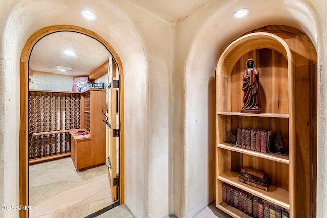 wine room featuring built in features