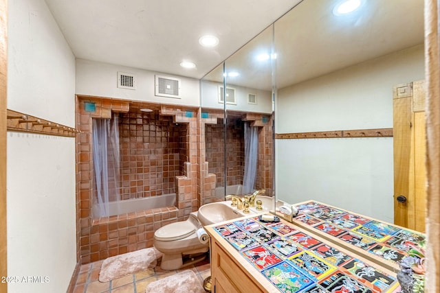 full bathroom with tiled shower / bath, vanity, toilet, and tile patterned flooring