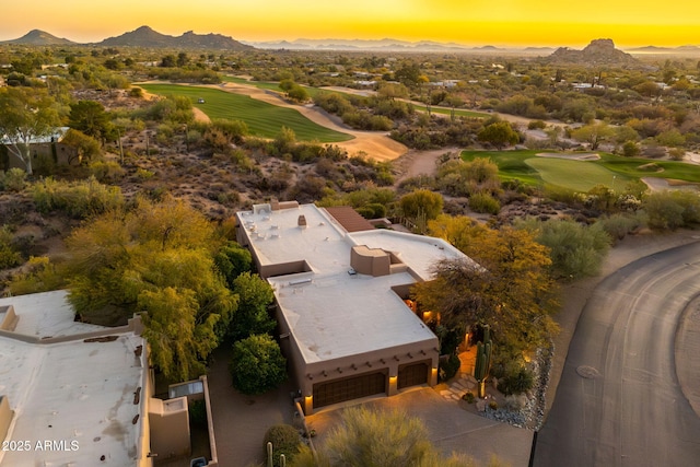 aerial view at dusk with a mountain view