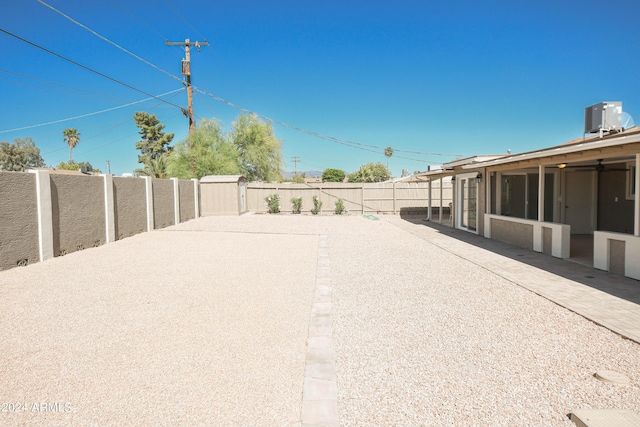 view of yard with a patio area and central air condition unit