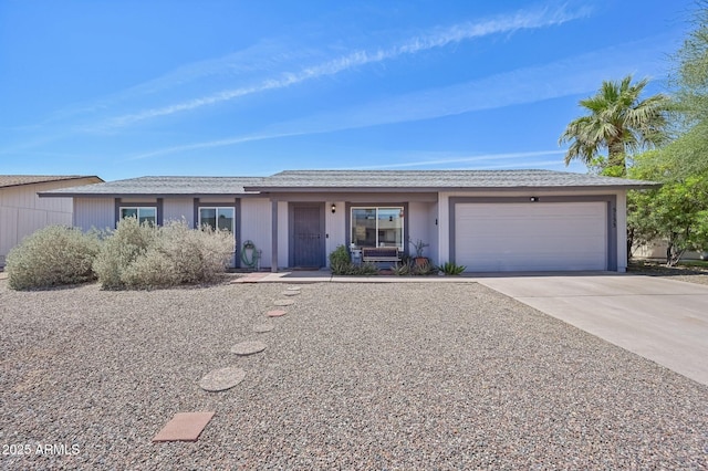 5133 E Keresan St, Phoenix, AZ 85044 - ranch-style house featuring an attached garage and driveway