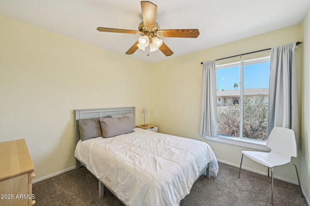 5133 E Keresan St, Phoenix, AZ 85044 - carpeted bedroom with baseboards and a ceiling fan