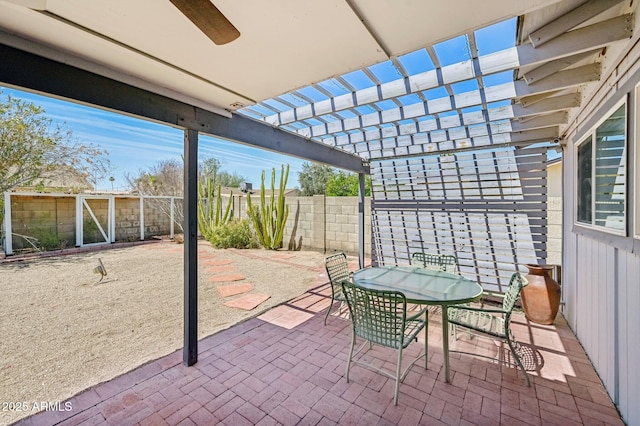 5133 E Keresan St, Phoenix, AZ 85044 - fenced backyard featuring outdoor dining space, a pergola, and a patio area