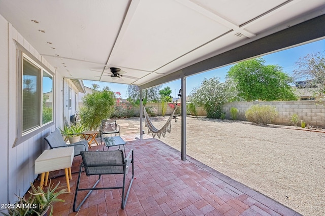 5133 E Keresan St, Phoenix, AZ 85044 - fenced backyard with a ceiling fan and a patio