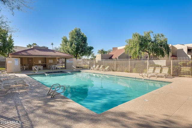 view of swimming pool featuring a patio