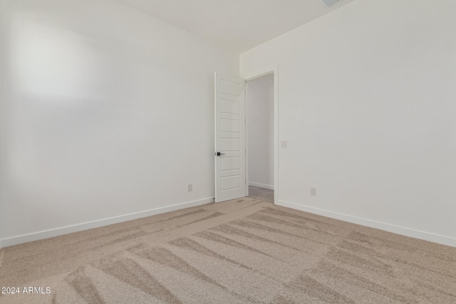 empty room with carpet floors