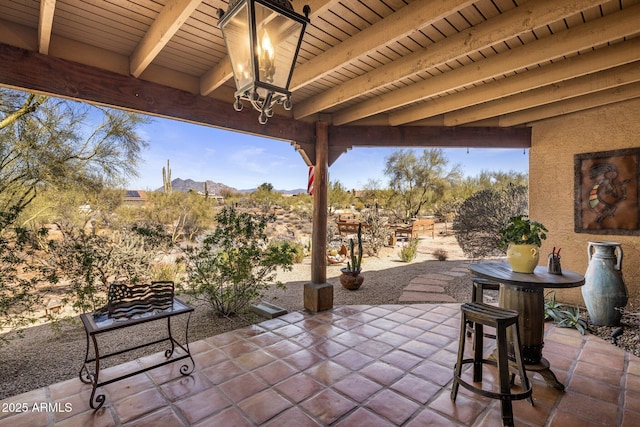 view of patio with a mountain view