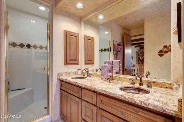 bathroom featuring vanity and walk in shower