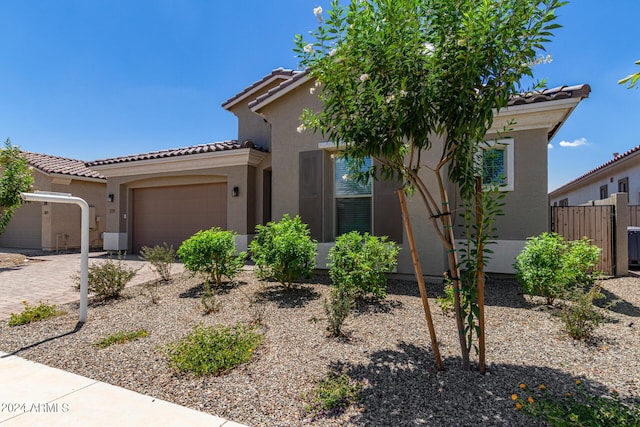 view of front of property with a garage