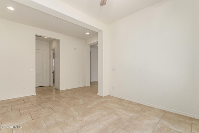 spare room featuring ceiling fan