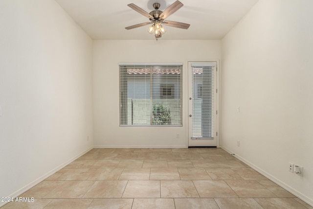 unfurnished room with ceiling fan