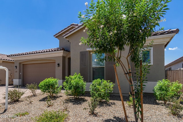 view of front of home with a garage