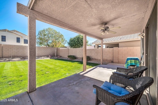 view of patio featuring ceiling fan