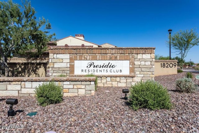 view of community sign