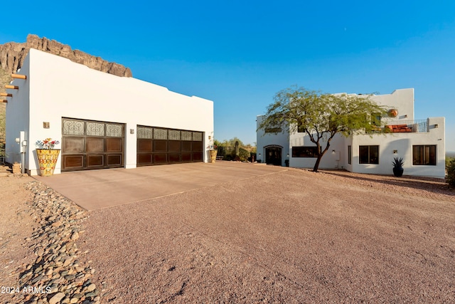 view of side of property with a garage