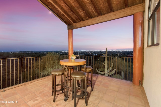 view of patio terrace at dusk