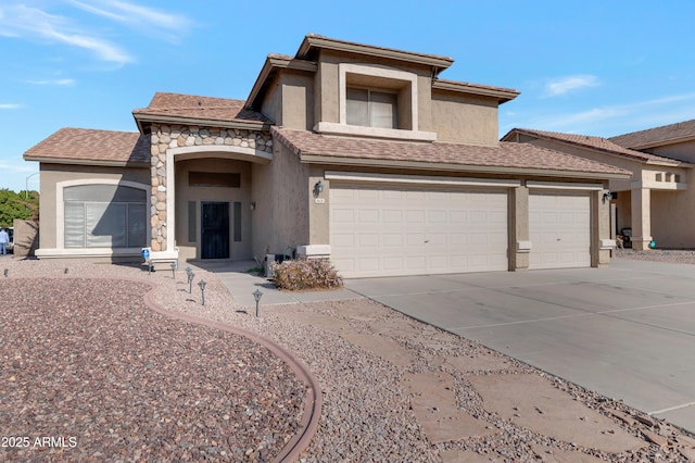 view of front of house with a garage