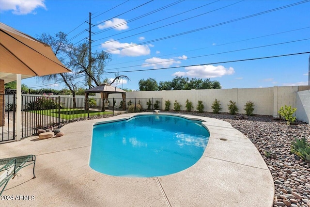 16008 N 56th Way, Scottsdale, AZ 85254 - view of pool featuring a gazebo, a fenced backyard, and a patio area