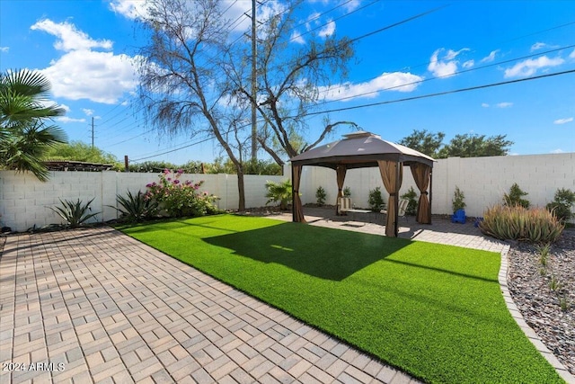 16008 N 56th Way, Scottsdale, AZ 85254 - view of yard featuring a patio and a gazebo
