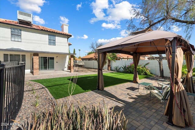 16008 N 56th Way, Scottsdale, AZ 85254 - view of patio / terrace with a gazebo and central AC unit