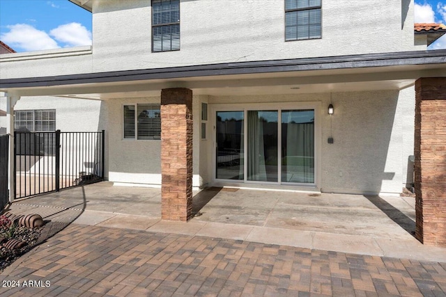 16008 N 56th Way, Scottsdale, AZ 85254 - back of house featuring stucco siding and a patio area