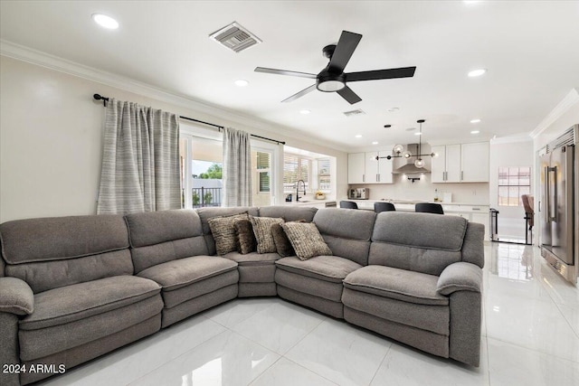 16008 N 56th Way, Scottsdale, AZ 85254 - living room featuring crown molding, a ceiling fan, light tile patterned flooring, and recessed lighting