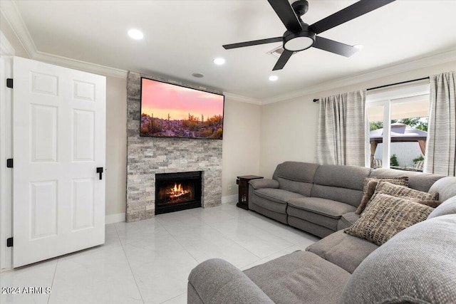 16008 N 56th Way, Scottsdale, AZ 85254 - living room with crown molding, ceiling fan, baseboards, a stone fireplace, and recessed lighting