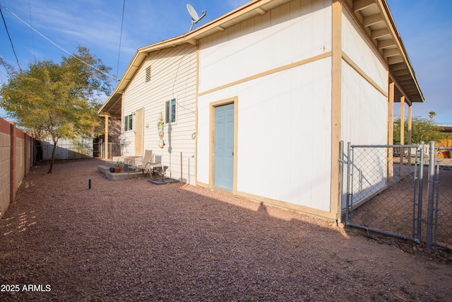 back of house featuring a patio area