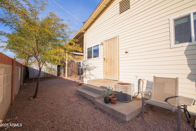 exterior space featuring central AC and a patio area