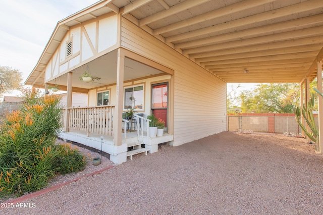 entrance to property featuring a porch