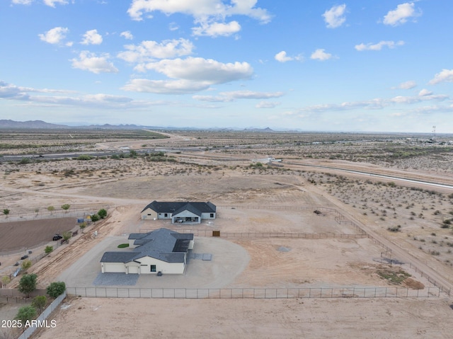 birds eye view of property featuring a mountain view