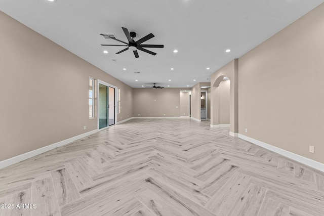 unfurnished living room with light parquet floors and ceiling fan