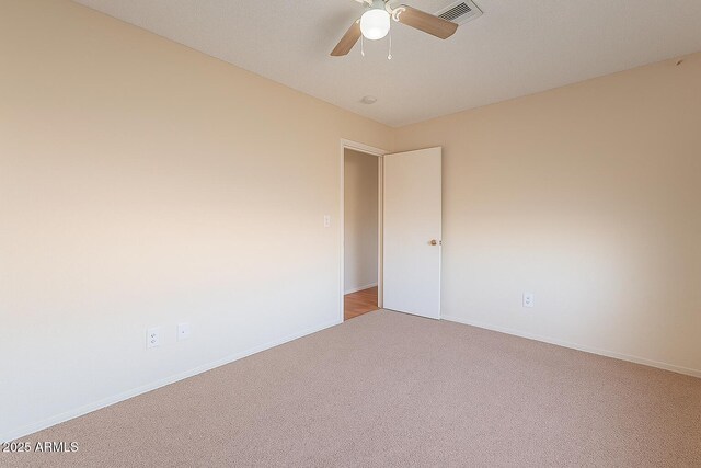 12613 N 51st Dr, Glendale, AZ 85304 - unfurnished room with carpet flooring, ceiling fan, and baseboards