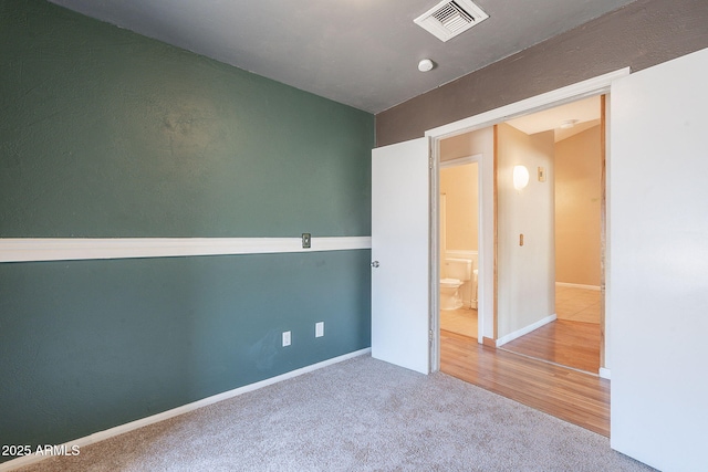 12613 N 51st Dr, Glendale, AZ 85304 - unfurnished bedroom featuring carpet and baseboards