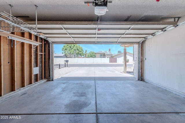 12613 N 51st Dr, Glendale, AZ 85304 - garage with a garage door opener and baseboards