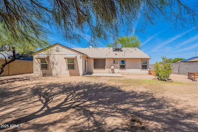 12613 N 51st Dr, Glendale, AZ 85304 - rear view of property featuring a patio area, a fenced backyard, and a shingled roof