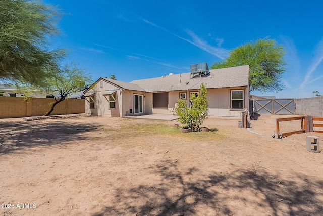 12613 N 51st Dr, Glendale, AZ 85304 - rear view of house featuring a patio area, central AC, a fenced backyard, and a shingled roof