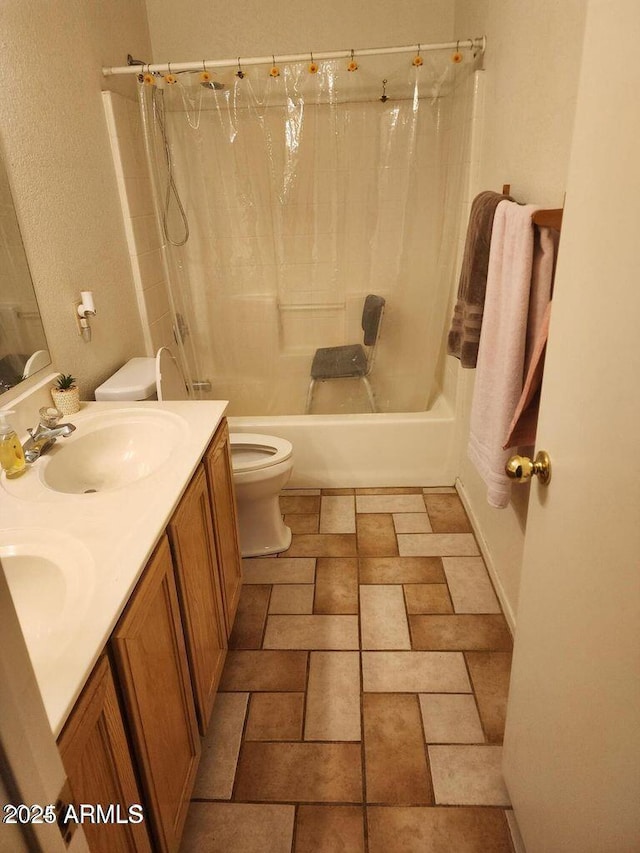 full bathroom with a sink, shower / bathtub combination with curtain, toilet, and double vanity