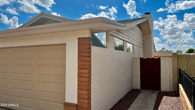 view of home's exterior featuring a garage